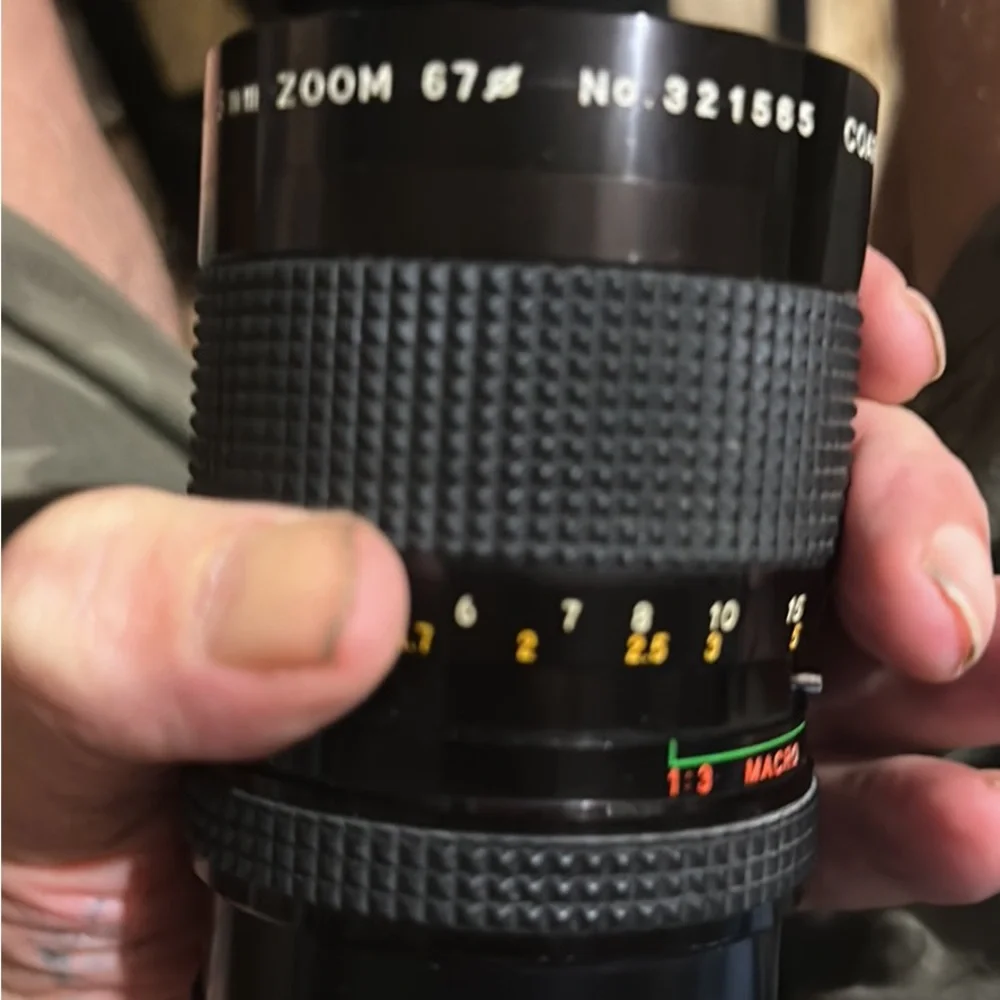 Two lenses one made by canon one made by prinz in box